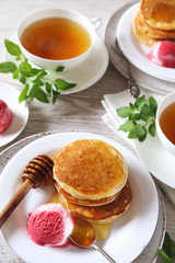 Banana pancakes with honey and fruit sorbet