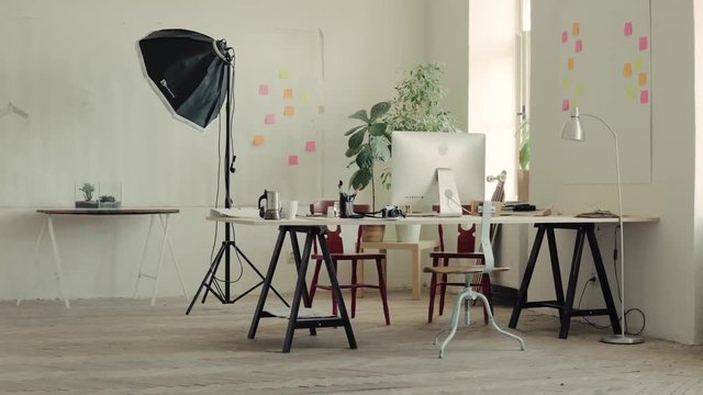 The interior of an empty modern office or a studio.