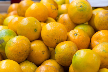 Healthy fruits, orange fruits background many orange fruits - orange fruit background