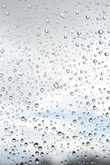 Drops of rain on the window, rainy day
