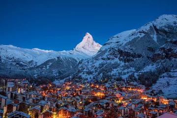 Fotobehang Early Morning landscape View on Zermatt city village  Valley and Matterhorn Peak in the Morning, Switzerland © martinhosmat083