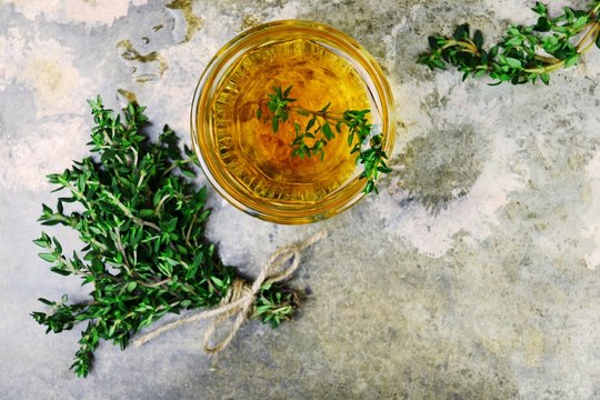Fresh Thyme tea close up. Herbal tea drink  top view