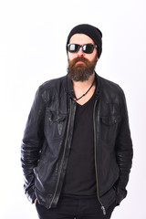 Urban lifestyle concept. Guy with beard in black leather jacket