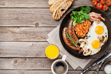 English breakfast. Fried eggs, sausages, bacon
