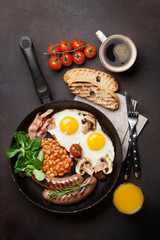 English breakfast. Fried eggs, sausages, bacon