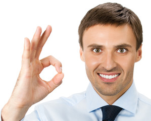 Businessman with okay gesture, isolated
