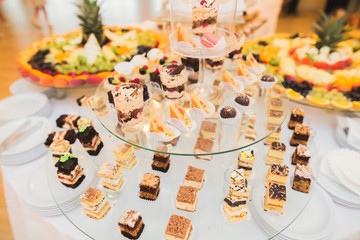 Different kinds of baked sweets on a buffet
