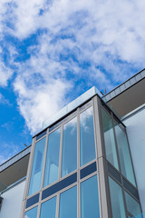 Fototapeta na wymiar Modern glass archetecture with blue sky