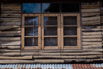 Fototapeta na wymiar beautiful window on old wood plank wall