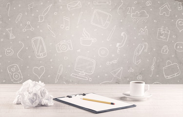 Design office desk with drawings background