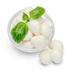 Mozzarella cheese and basil in bowl on white background