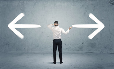Confused business person choosing the way