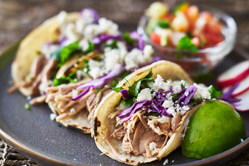 Street tacos - with carnitas, red cabbage and queso fresco cheese