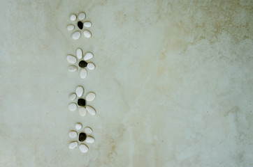 simple flowers from pebbles