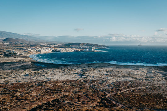View of the ocean bay with the little town on the shore in the morning 