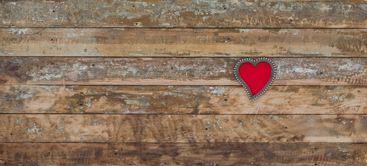 Valentine's day, heart on a wooden background