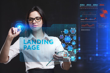 The concept of business, technology, the Internet and the network. A young entrepreneur working on a virtual screen of the future and sees the inscription: Landing page