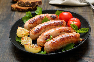 Barbecue sausages in frying pan