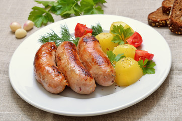 Fried sausages and potatoes