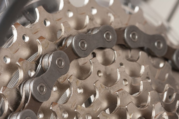 Close up of chain on  9-speed cassette on rear wheel of bike, studio photo