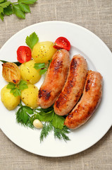Roasted sausages and vegetables