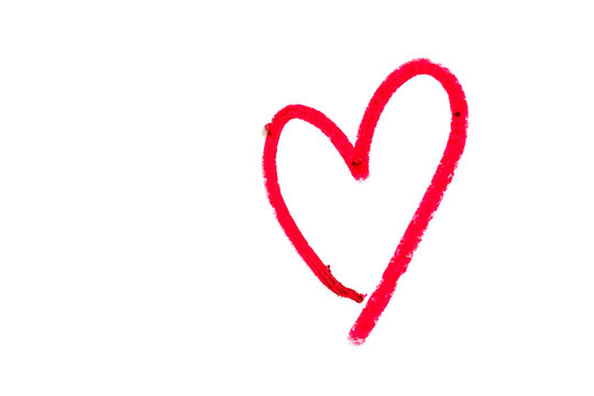 Red heart shape written from red lipstick on white background with copy space for Valentine's day and love concept