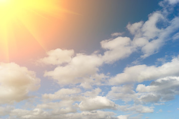 sky with clouds and sun. A textured background.Copy paste place