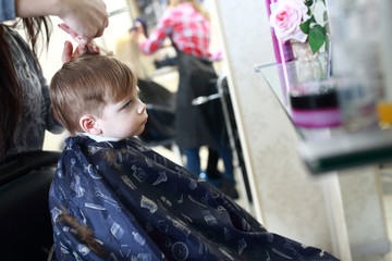 Boy in barber shop