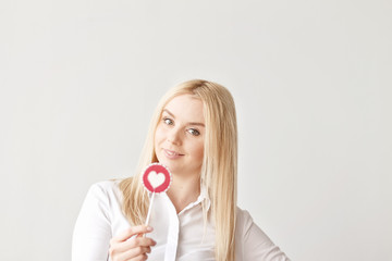 beautiful young girl and candy heart, Valentine's day