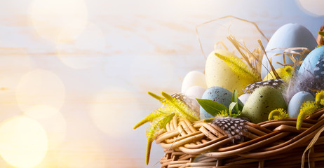 Easter background with Easter eggs in the basket