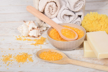 fruit bath salt with olive oil and gray natural soap next to the orchidwith place for text