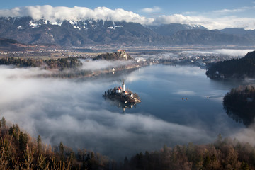 Fototapeta na wymiar aerial view over lake Bled on a foggy morning from Ojstrica viewpoint, Slovenia, Europe - travel background