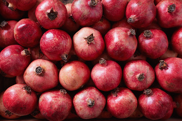 Fototapeta na wymiar Pomegranates Packed in Shipping Crate