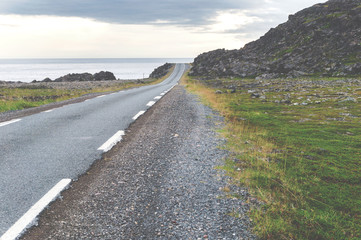 Rocky cliffs along the Varanger National Tourist Route, Finnmark, Norway