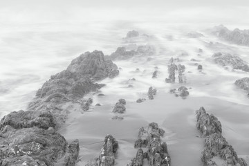 Cantabrian Sea. Landscape with fog in the Portio Beach. Liencres. Cantabria. Spain.