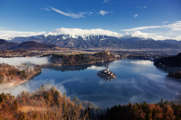 aerial view over lake Bled on a foggy morning from Ojstrica viewpoint, Slovenia, Europe - travel background