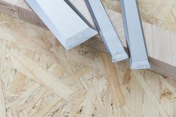 professional chisels on a wooden background