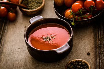 Tomato soup on wood