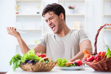 Young man in healthy eating and dieting concept