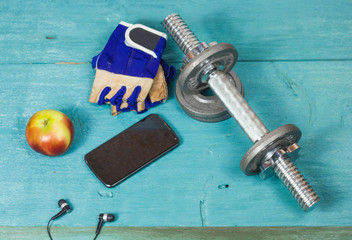 Sports accessories for fitness on the blue floor