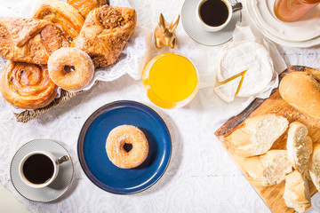 Breakfast with French Pastries, Bread, Cheese and Coffee