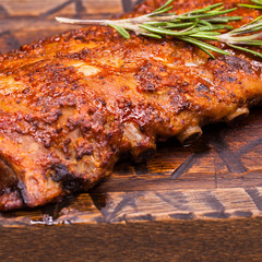 Closeup of pork ribs grilled with BBQ sauce