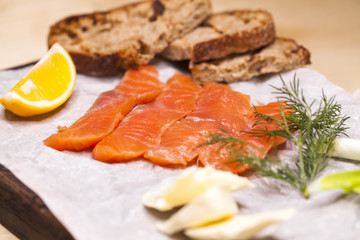 Fresh salmon sashimi salad on bamboo dish