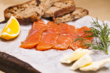 Fresh salmon sashimi salad on bamboo dish