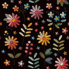 Embroidery seamless pattern with beautiful colorful flowers and leaves on black background. Fashion design. Vector embroidered illustration.