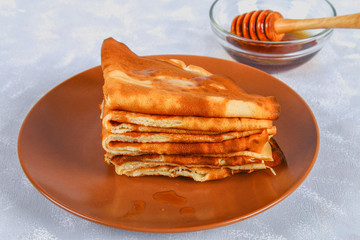 Traditional Ukrainian or Russian pancakes. Shrovetide Maslenitsa. Traditional dishes on the holiday Carnival Maslenitsa Shrovetide.
