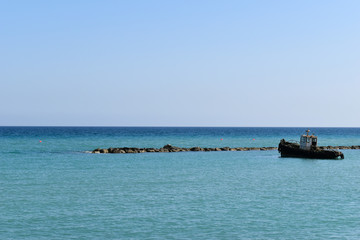 A Rusty Boat in the Mediterranean Sea