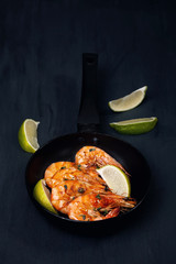 Freshly cooked shrimps with lime