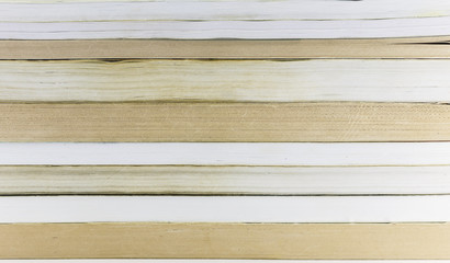 A stack of books lying on a white background