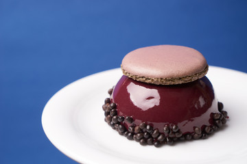 Three berries cake dessert with macarron